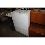 A white painted cupboard fitted two drawers