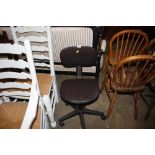 A black upholstered swivel office chair