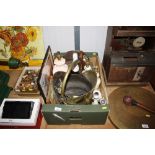 A box containing lamps, clocks, coal scuttle etc