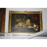 A still life picture on canvas in decorative gilt