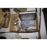 A box containing various silver plated cutlery; a