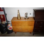 An oak drop leaf table