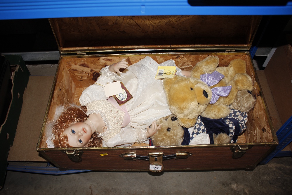 A storage trunk and contents of dolls and soft toy