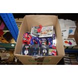 A box of various boxed Corgi model F1 cars etc.