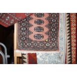 An approx. 3'4" x 2'1" Eastern pattern rug