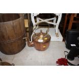 A copper and brass kettle