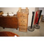 An oak chest fitted four graduated drawers AF