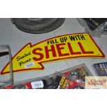 A reproduction Shell plaque
