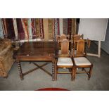 An oak draw leaf table and a set of four barleytwi