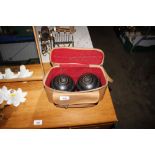 A pair of bowling woods in fitted case