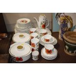 A Meakin poppy decorated coffee/dinner service