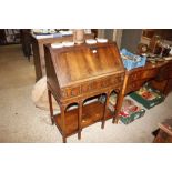 A Georgian style mahogany bureau on stand