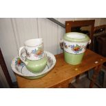 An Edwardian transfer printed toilet jug and bowl