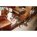 A mahogany drop leaf coffee table with leatherette