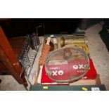 A box of old advertising tins, including Oxo; a b