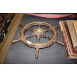 A brass and iron mounted ships wheel