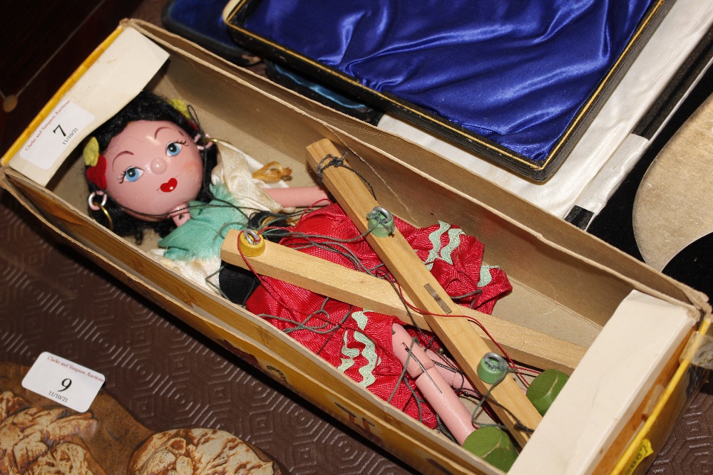 A Pelham standard puppet in box