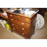 An antique oak chest fitted two short and three l