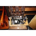 A Harris OH sewing machine - sold as a collector's