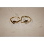 An 18ct gold ring set single diamond, size L and a