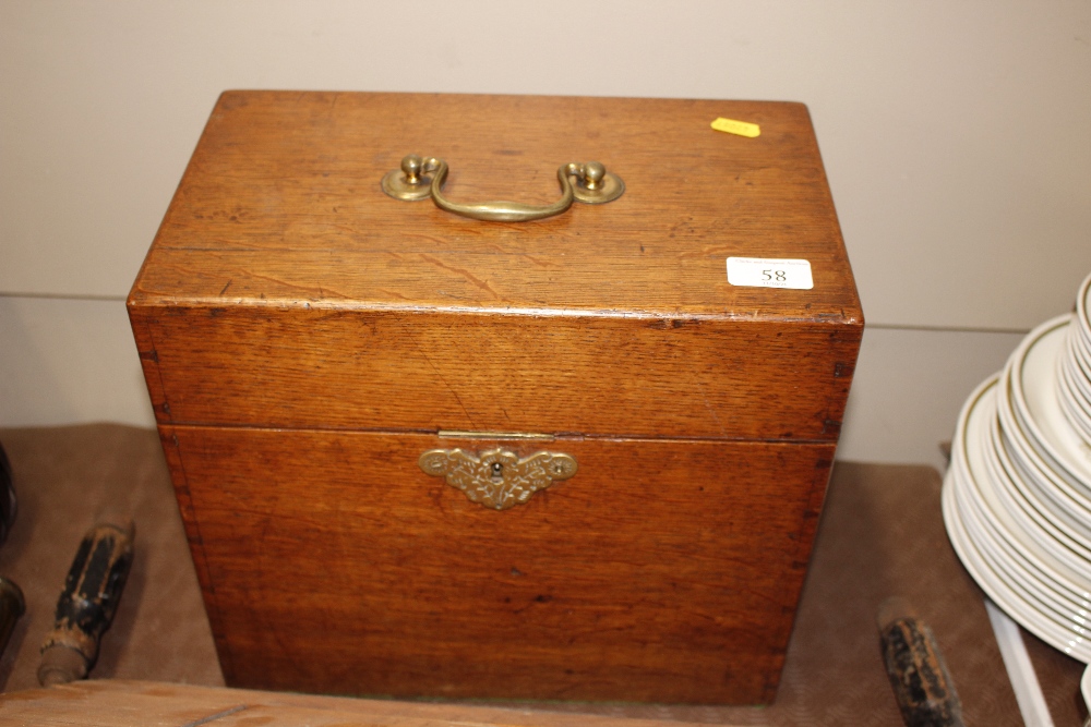 A Victorian golden oak and brass mounted cutlery b