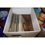 A box of miscellaneous LP records