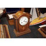 An Edwardian inlaid mantel clock