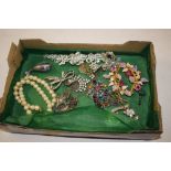 A tray box of miscellaneous costume jewellery