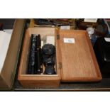 A wooden box and contents of various vintage fount