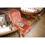 A Victorian mahogany spoon back armchair, upholste