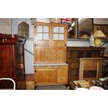 A retro oak and enamel top kitchen dresser