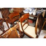 A pair of 19th Century mahogany bar back dining ch