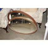 Two oval mirrors