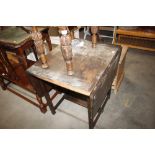 An oak drop leaf table