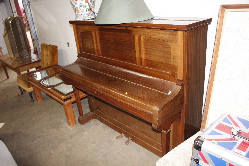 A Burling & Mansfield upright piano
