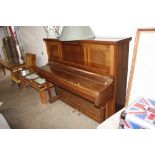 A Burling & Mansfield upright piano