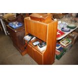 A teak drinks cabinet