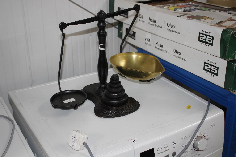 A set of Salter cast iron scales with weights and