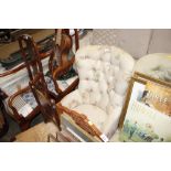 A floral upholstered and button back nursing chair