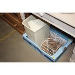 A box containing furniture handles, plate rack, pl