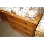 An oak chest fitted three drawers