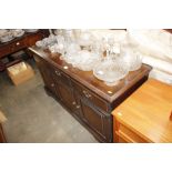 A reproduction mahogany sideboard fitted three dra