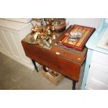 A 19th Century mahogany Pembroke table lacking sin