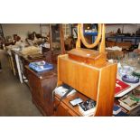 A dressing chest fitted three long drawers