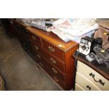 A mahogany chest fitted two short over three long