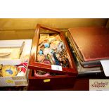 A box of various costume jewellery