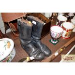 A pair of black leather German boots