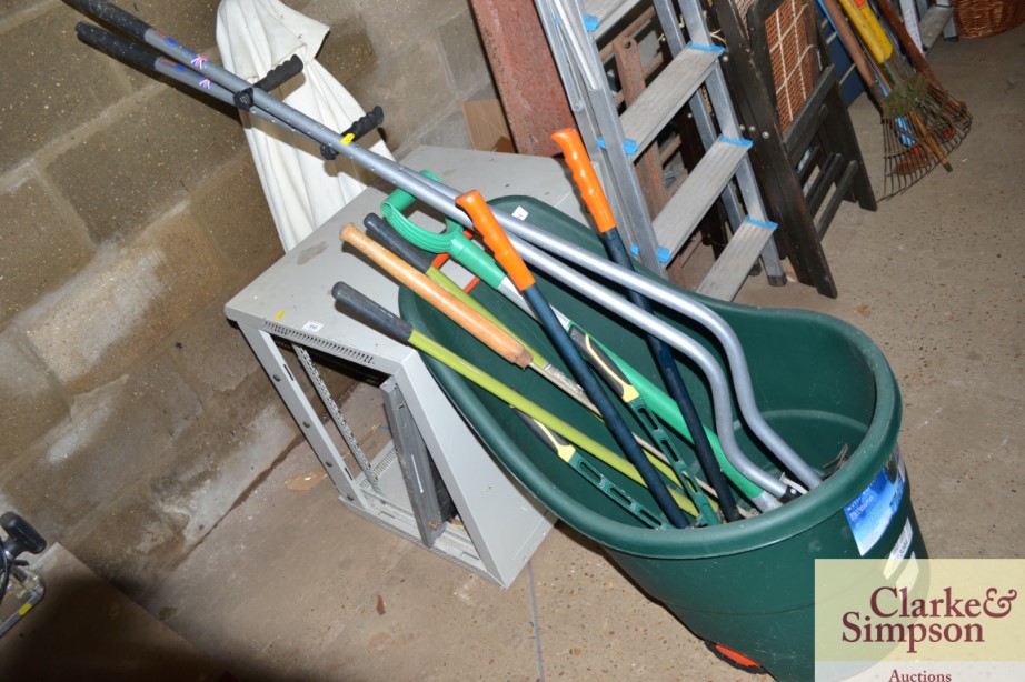 A plastic wheeled garden caddy and a quantity of t