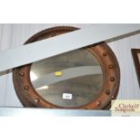 A gilt framed convex mirror