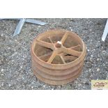 A set of four cast iron rings/ wheels